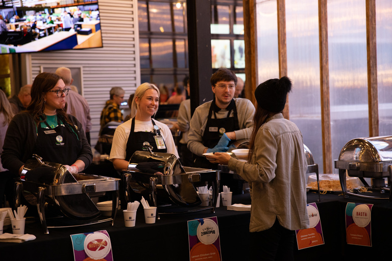 volunteers serving soup